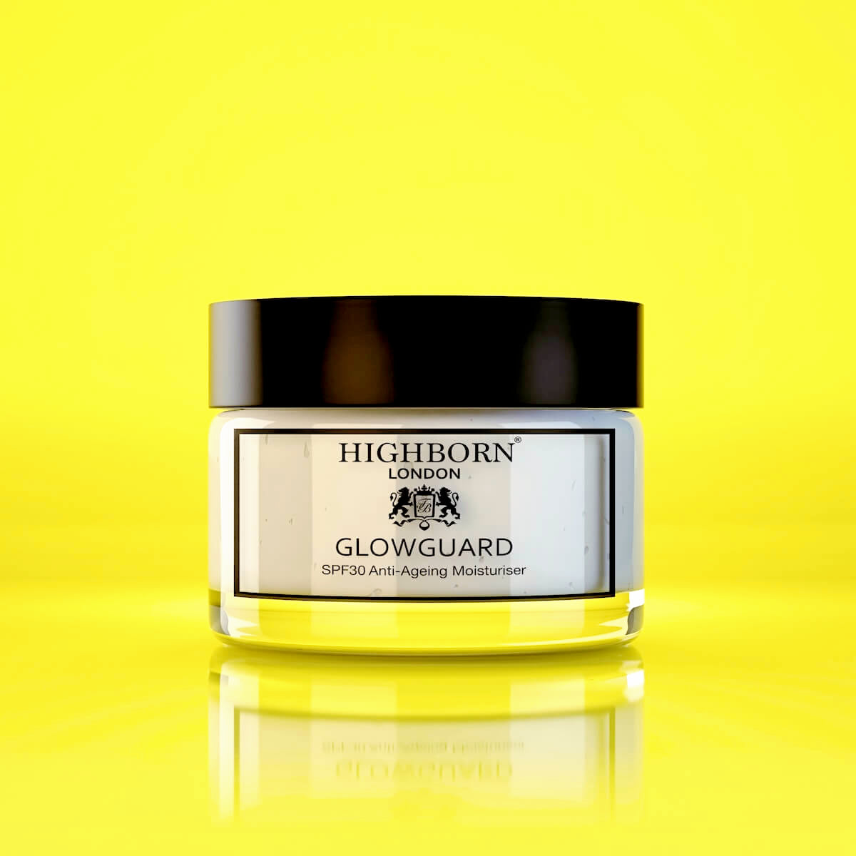Straight-on close-up of the Highborn London GLOWGUARD SPF30 Anti-Ageing Moisturiser jar with a subtle mirror reflection on a bright yellow studio background