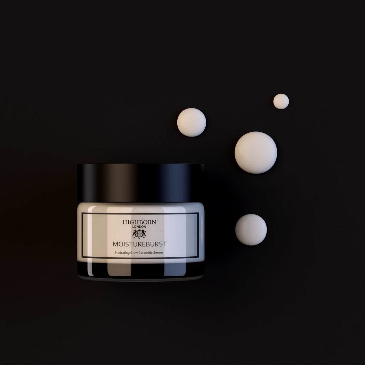 Highborn London MoistureBurst Hydrating Glow Ceramide Serum jar on a dark background next to four dollops of white cream