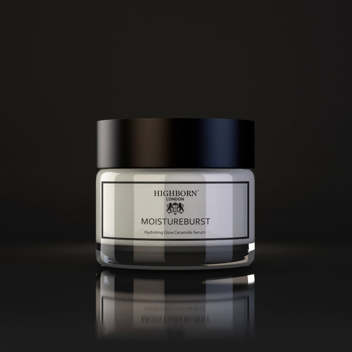 Product jar of Highborn London MoistureBurst Hydrating Glow Ceramide Serum with a black lid centred on a dark reflective surface