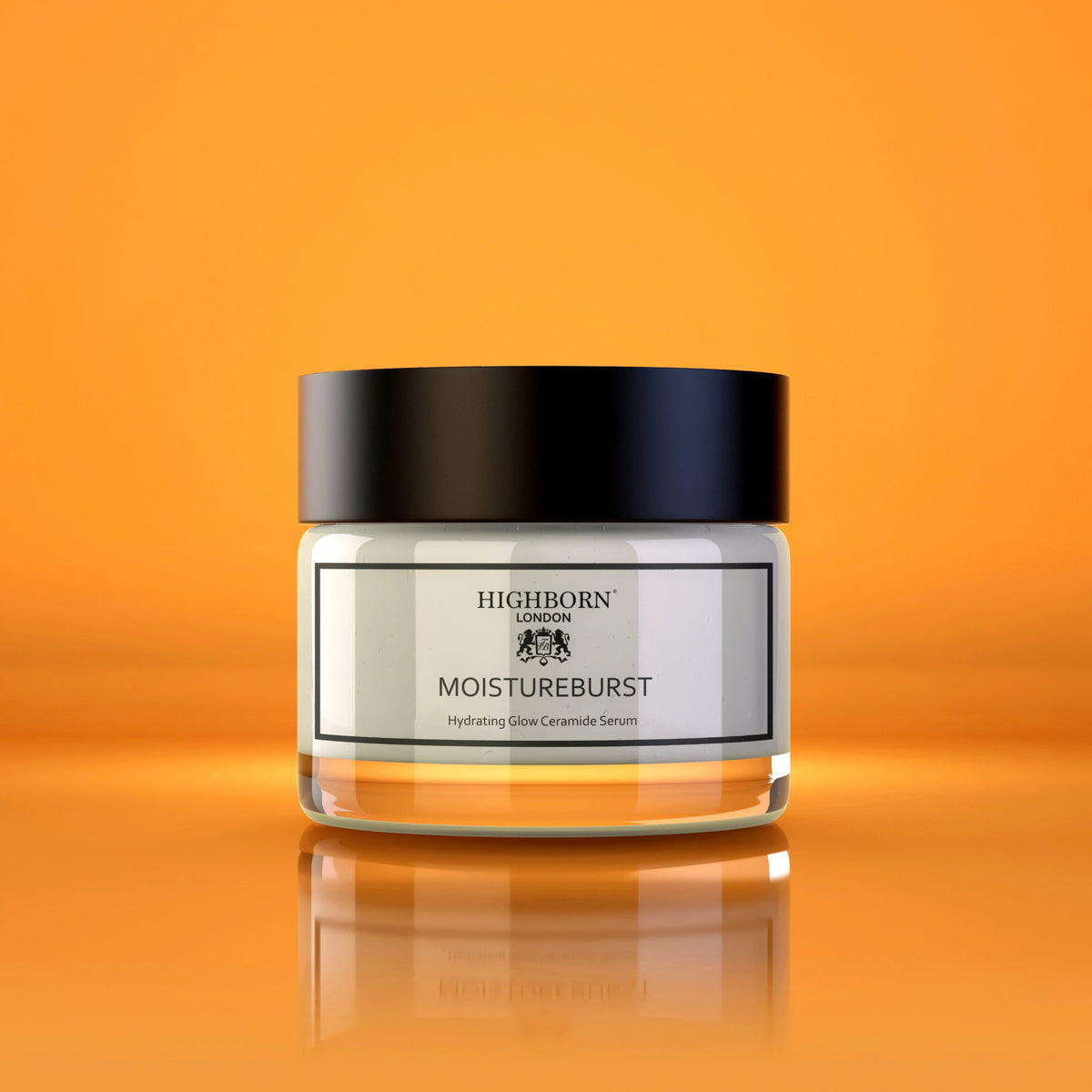 Product jar of Highborn London MoistureBurst Hydrating Glow Ceramide Serum with a black lid centred on an orange gradient background with reflection